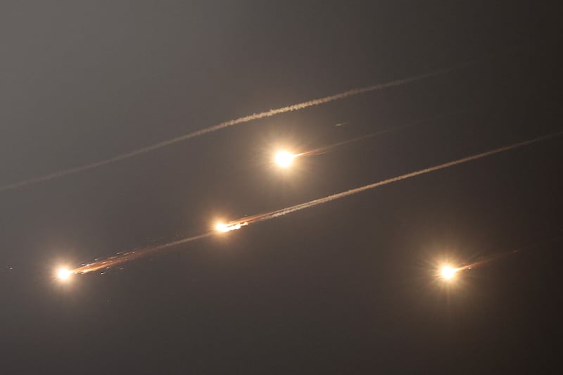Rocket trails in the sky above Jerusalem. Photograph: Ahmad Gharabli/AFP/Getty Images