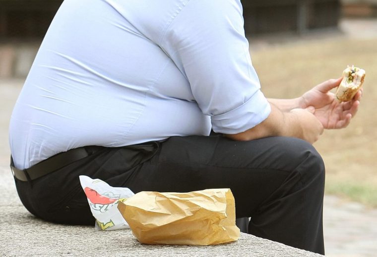Embargoed to 0001 Saturday January 22 File photo dated 28/07/10 of an overweight man. Obese people are being encouraged to ask their pharmacist about a free online NHS weight loss programme. Issue date: Saturday January 22, 2022. PA Photo. Until now, obese patients with either high blood pressure or diabetes had to be seen by their GP before they could access the 12-week weight management plan in England. See PA story HEALTH Obesity. Photo credit should read: Dominic Lipinski/PA Wire