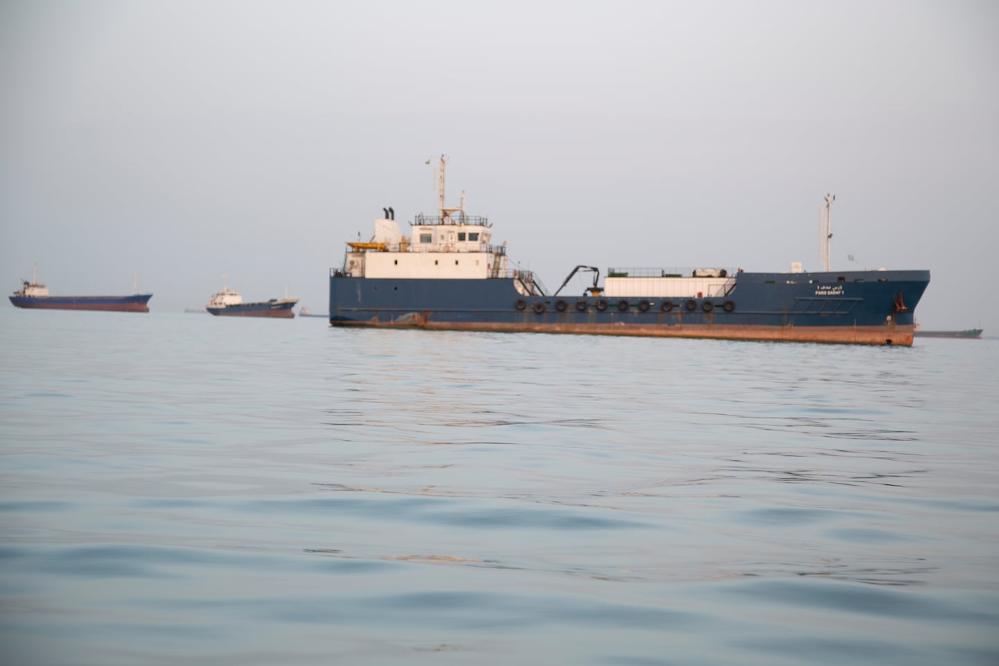 Ships are anchored near the shoreline on April 22, 2026 in Bandar Abbas, Iran. Bandar Abbas is a port city and the capital of Hormozgan Province, along the Persian Gulf and Strait of Hormuz. Earlier today, Iran's Islamic Revolutionary Guards Corps said it had attacked and seized two ships near the Strait of Hormuz as it tried to assert control over the critical waterway. The incidents came the day after US President Trump announced an extension of a ceasefire between his country and Iran, and after Iran refused to attend the latest proposed round of peace talks in Islamabad.