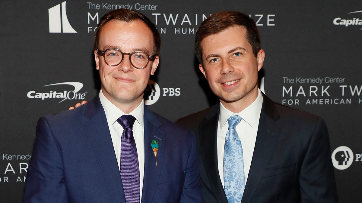 Chasten Buttigieg standing next to Pete Buttigieg at the Kennedy Center in Washington, D.C.