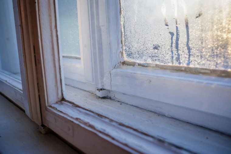 Berlin, Germany - January 20: Condensation has been reflected on a cold winter morning on an old double box window on January 20, 2019 in Berlin, Germany. (Photo by Thomas Trutschel/Photothek via Getty Images)