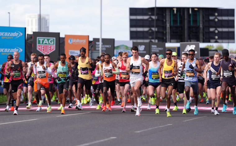 Competitors including Tamirat Tola, Kenenisa Bekele and Norman Shreeve leave the start of the men's elite race during the TCS London Marathon. Picture date: Sunday April 21, 2024. PA Photo. See PA story ATHLETICS London. Photo credit should read: Zac Goodwin/PA Wire. RESTRICTIONS: Use subject to restrictions. Editorial use only, no commercial use without prior consent from rights holder.