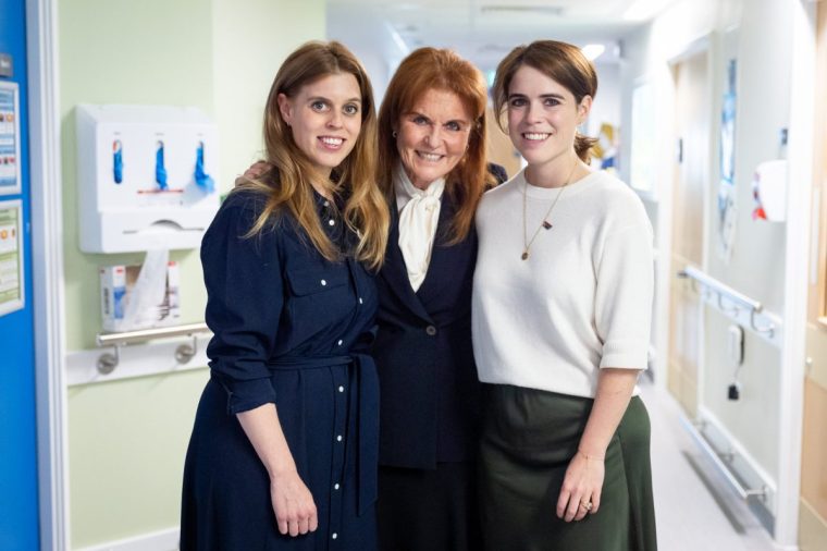 Sarah, Duchess of York with her daughters Princess Beatrice and Princess Eugenie during a visit to the Teenage Cancer Trust unit at University College Hospital, London. Picture date: Wednesday April 23, 2025. PA Photo. See PA story ROYAL Sarah. Photo credit should read: Aaron Chown/PA Wire
