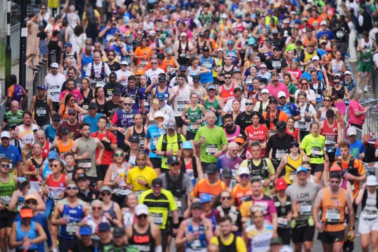File photo dated 27/04/25 of people taking part in the TCS London Marathon. This year's London Marathon is set to break a new world record for the biggest annual one-day fundraising event, organisers said. The 2025 event has already raised more than ?75 million for charities, beating the existing world record of ?73.5 million, set at the 2024 TCS London Marathon. Issue date: Thursday May 1, 2025. PA Photo. See PA story SOCIAL Marathon. Photo credit should read: Yui Mok/PA Wire