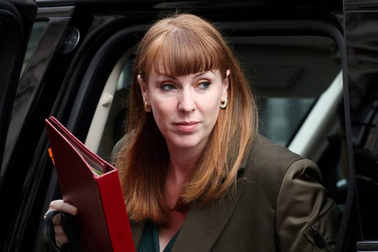 FILE PHOTO: Deputy Prime Minister Angela Rayner exits a vehicle in Downing Street in London, Britain, March 26, 2025. REUTERS/Hannah McKay/File Photo