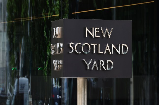 New Scotland Yard sign is seen at the Metropolitan Police Service headquarters in London, Great Britain on July 9, 2025. (Photo by Jakub Porzycki/NurPhoto via Getty Images)
