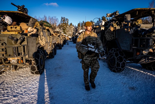 Soldiers from the 2nd Battalion The Royal Anglian Regiment (The Poachers) around their Jackal vehicles on the Tapa range in Estonia where British soldiers are taking part in Exercise Winter Camp, which is part of Operation Cabrit, the UK's contribution to Nato's Forward Land Forces in Estonia and Poland. Picture date: Tuesday February 3, 2026. PA Photo. Photo credit should read: Ben Birchall/PA Wire
