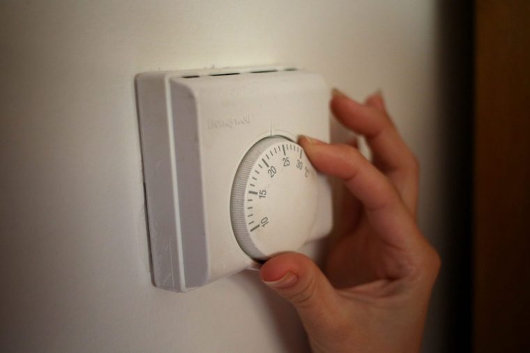 File photo dated 19/09/13 of a general view of a central heating thermostat. Households are set to learn their energy bills will fall by around 7% from April in a shake-up of costs after the Government promised they will receive an average ?150 cut. Latest predictions suggest Ofgem will reduce the energy price cap by ?117 to ?1,641 a year for a typical dual fuel household from April 1 when it makes its announcement on Wednesday. Issue date: Sunday February 22, 2026. PA Photo. Photo credit should read: Steve Parsons/PA Wire