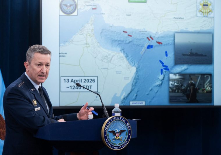TOPSHOT - US Chairman of the Joint Chiefs of Staff General Dan Caine speaks during a press briefing at the Pentagon in Washington, DC, on April 16, 2026. The United States will prevent all shipping from entering or exiting Iranian ports in the Strait of Hormuz for 