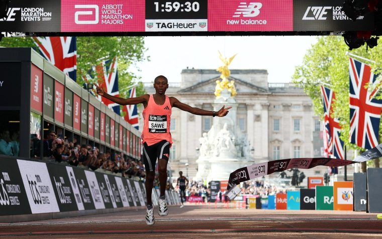 Athletics - London Marathon - London, Britain - April 26, 2026 Kenya's Sabastian Sawe crosses the finish line to win the men's elite race REUTERS/Matthew Childs