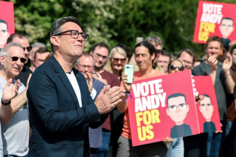 Greater Manchester Mayor and Labour candidate Andy Burnham gestures during his campaign launch ahead of the Makerfield by-election, triggered by the resignation of Labour MP Josh Simons, in Ashton-in-Makerfield, Britain, May 22, 2026. REUTERS/Temilade Adelaja