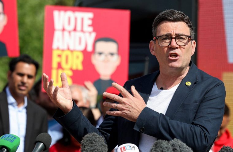 Greater Manchester Mayor and Labour candidate Andy Burnham speaks during his campaign launch, ahead of the Makerfield by-election triggered by the resignation of Labour MP Josh Simons, in Ashton-in-Makerfield, Britain, May 22, 2026. REUTERS/Temilade Adelaja