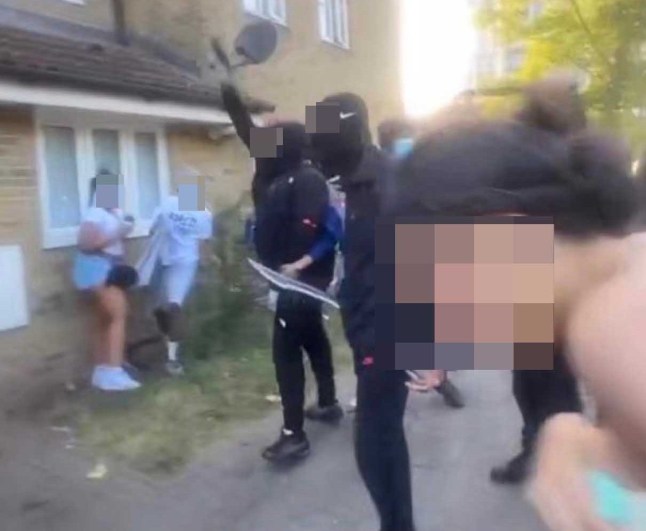 Screen grabs of people brandishing knives on the street in Hackney, London.