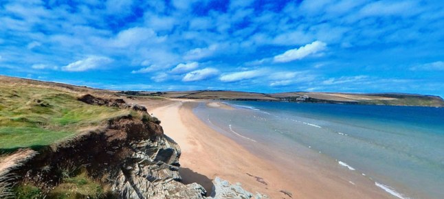 A man has died in Cornwall after trying to save two family members who got into difficulty in the water. Police were called by the ambulance service to a beach near Padstow around 3.50pm on bank holiday Monday (May 25). A man was