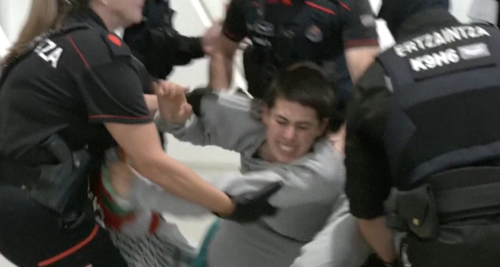 Spanish police beat and detain Gaza flotilla activists at airport | Israel-Palestine conflict