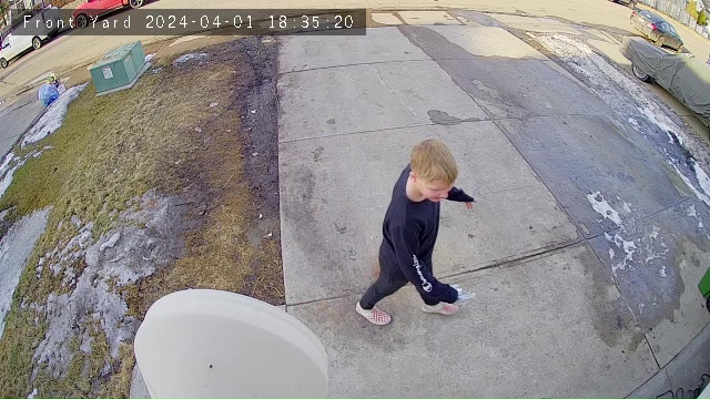Court evidence video still of Kache Grist playing on the driveway shortly before being killed by two dogs in his father’s landlord’s home in south Edmonton’s Summerside neighbourhood in April 2024.