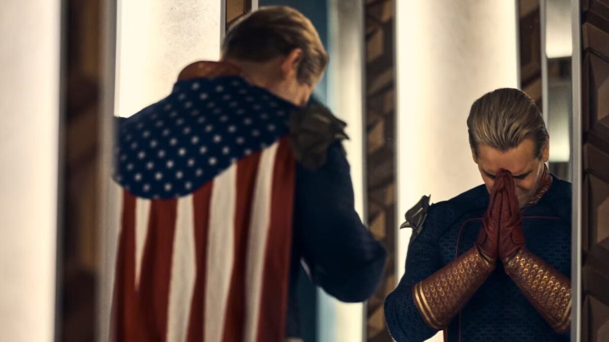Homelander sighs in front of a mirror.
