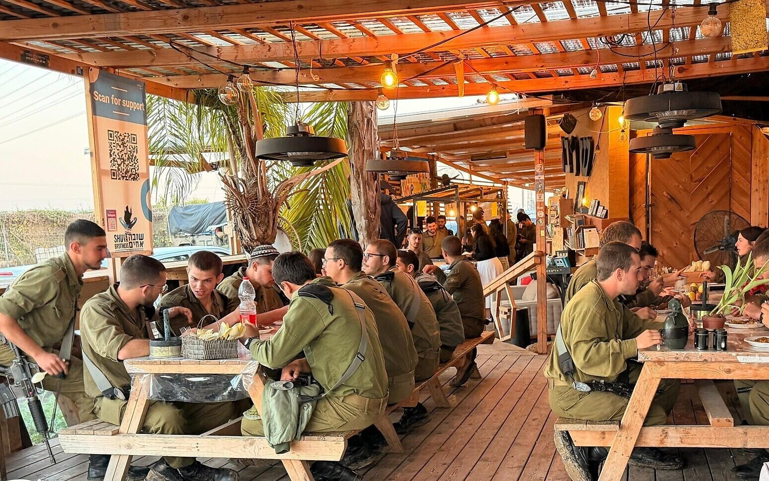 Pop-up stop for soldiers on Gaza border draws volunteers from across the globe