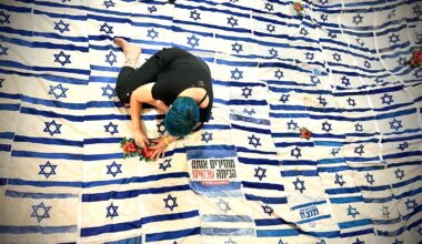 Using discarded Israeli flags, artist tries to stitch divided country together