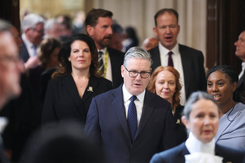 Britain's prime minister Keir Starmer walks through the House of Commons to attend the state opening of Parliament at the Palace of Westminster in London on Thursday. Photo graph: Toby Melville/AFP via Getty Images