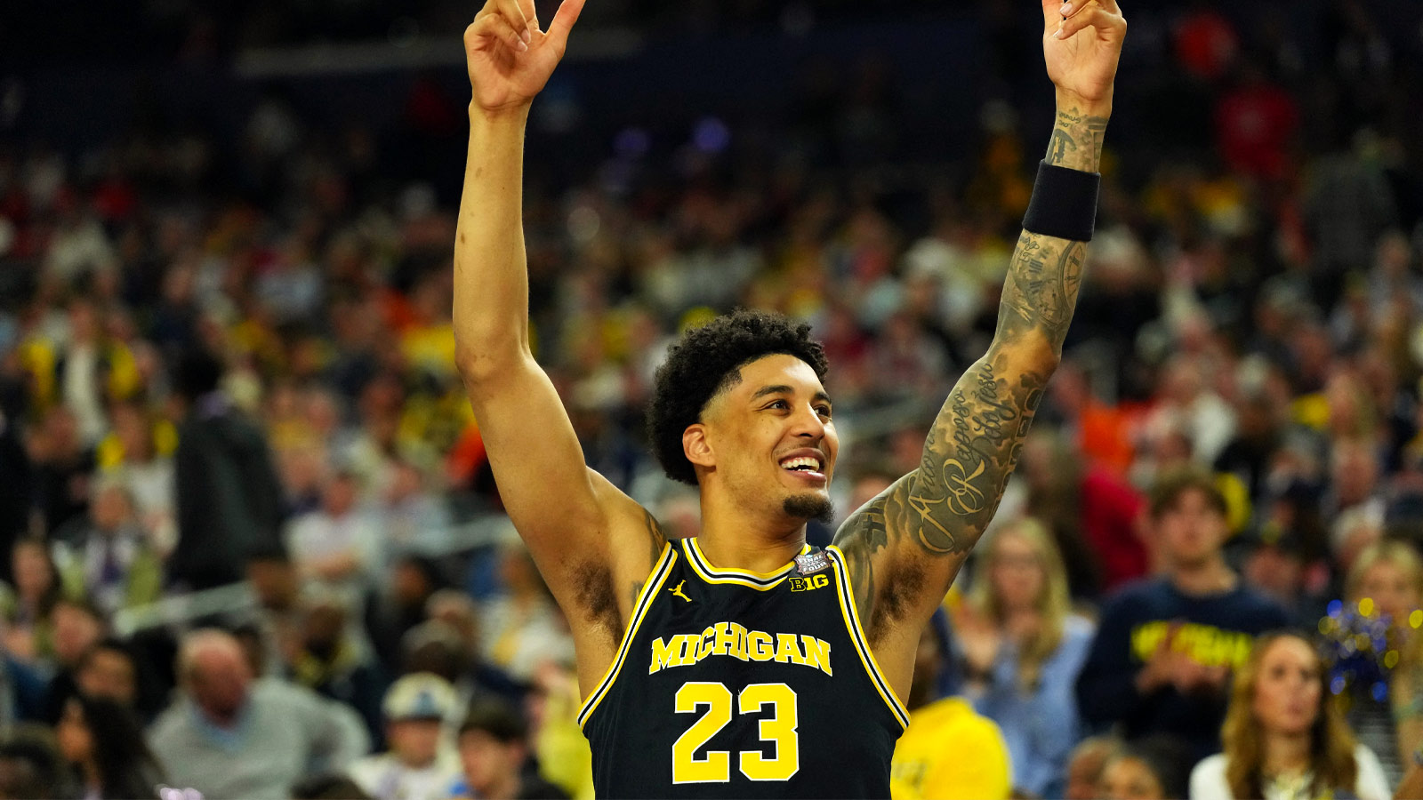 Michigan Wolverines forward Yaxel Lendeborg (23) celebrates against the Arizona Wildcats in a semifinal of the Final Four of the men's 2026 NCAA Tournament at Lucas Oil Stadium. 