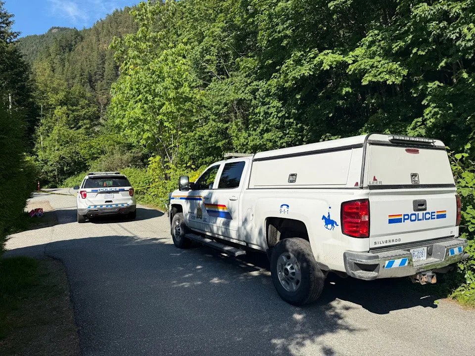 RCMP are seen at McLean's home in the Brunswick Beach area of Lions Bay, B.C., on May 21, 2026.