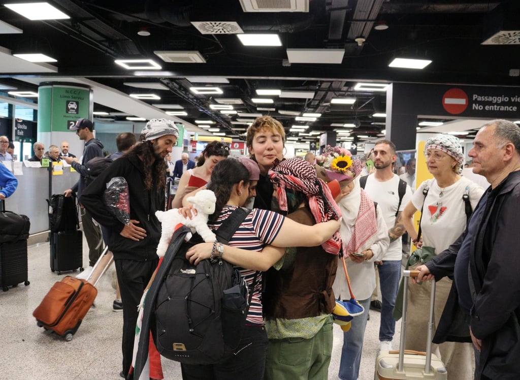 Some of the activists from the Global Sumud Flotilla, which was trying to get aid to Gaza, arrive in Rome on Saturday after being released by the Israeli authorities. Photo: EPA