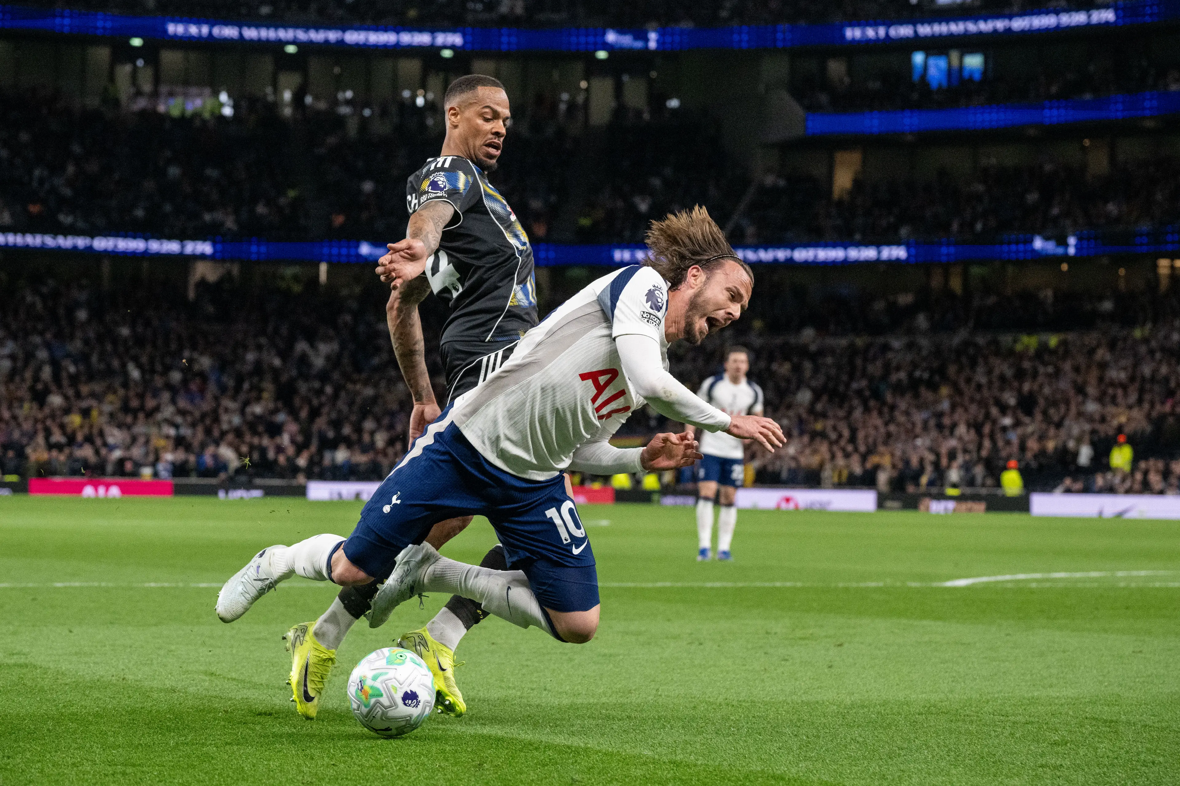 James Maddison goes down in the area. Image credit: Getty
