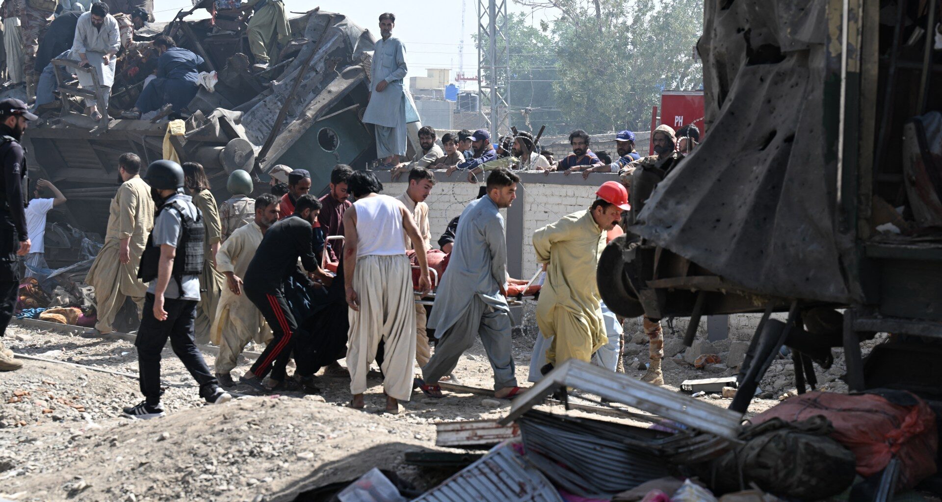 Suicide car bomb attack on train in Pakistan kills at least 24 | Conflict News