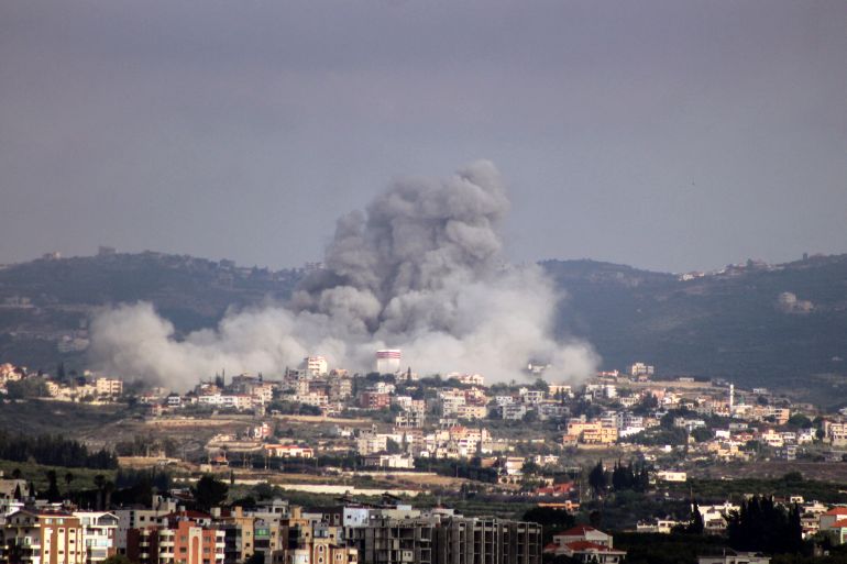 A photograph taken from the Tyre region of southern Lebanon shows smoke rising from the site of Israeli airstrikes that targeted the village of Rmadiyeh in the Tyre district of southern Lebanon on May 26, 2026.