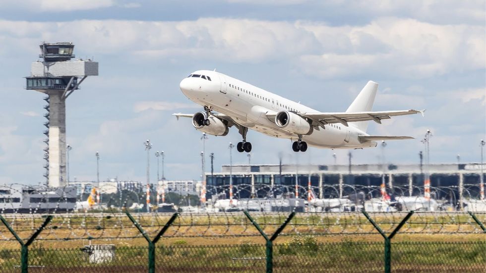 Airplane leaving airport