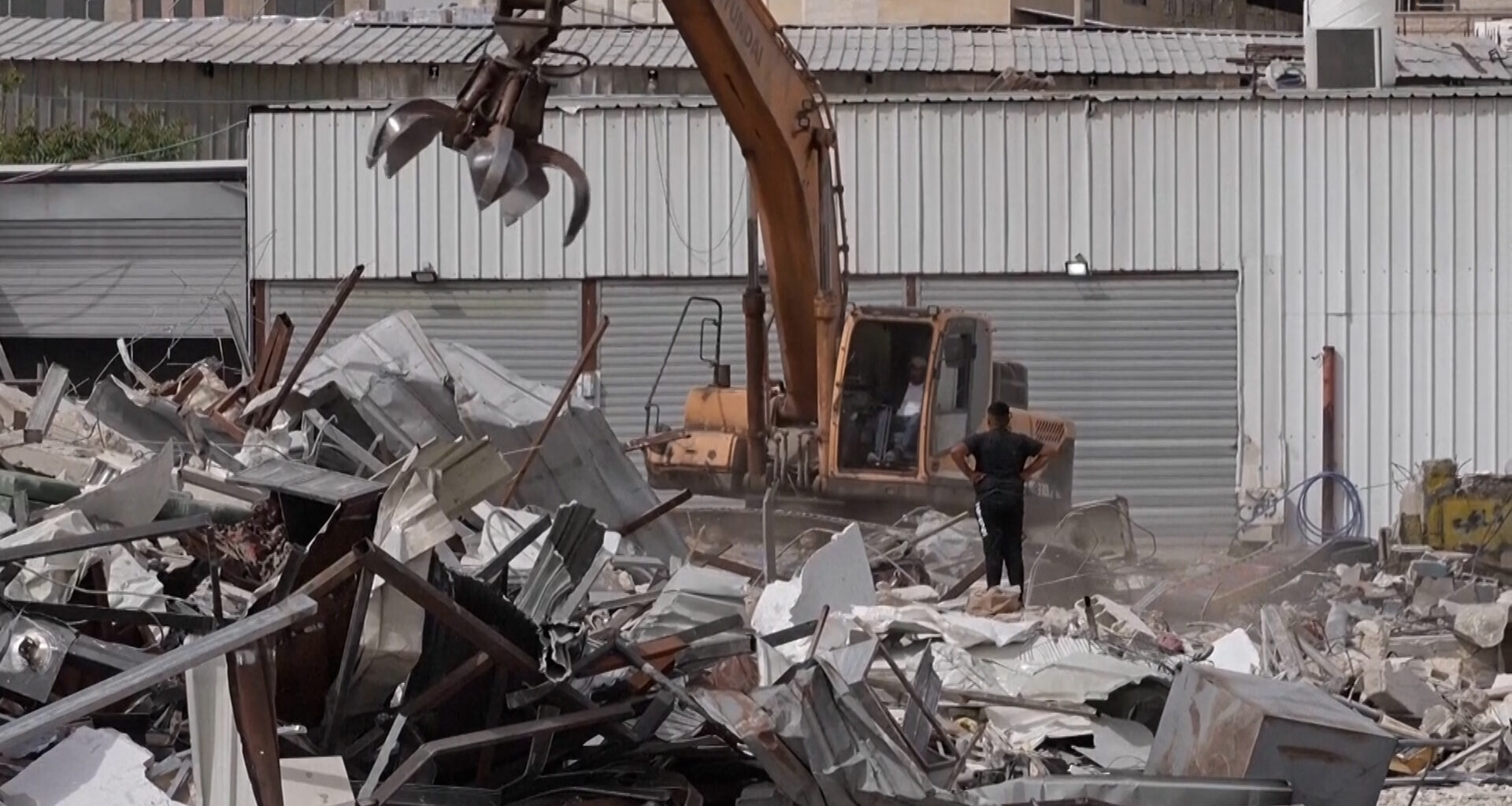 Israel bulldozes Palestinian shops to make way for settlement-linked road | Occupied West Bank