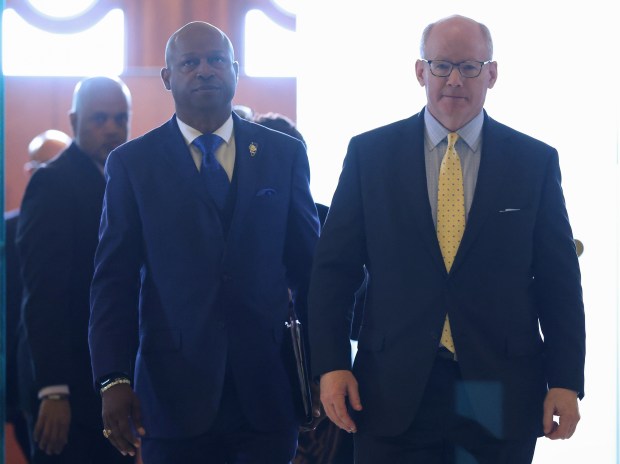 House Speaker Emanuel "Chris" Welch, front left, and Senate President Don Harmon exit after a meeting with Gov. JB Pritzker during the spring legislative session at the State Capitol, May 29, 2026, in Springfield. (John J. Kim/Chicago Tribune)