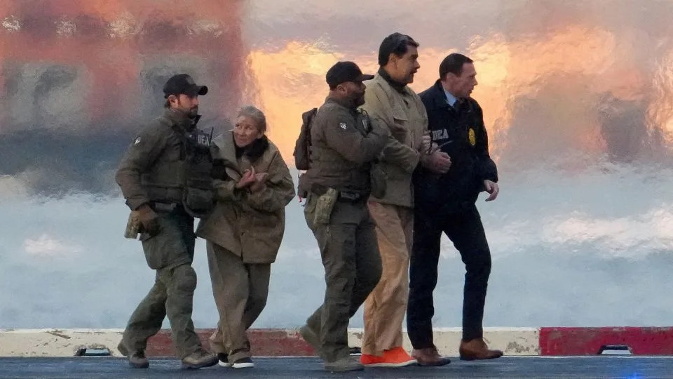 Law enforcement officials escort captured Venezuelan President Nicolas Maduro and his wife Cilia Flores to a courthouse in New York City, on January 5. - Adam Gray/Reuters