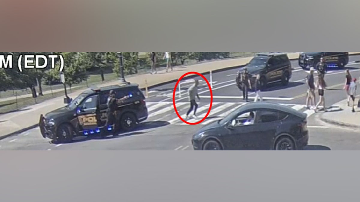 Police officers standing near a crime scene in Washington D.C.