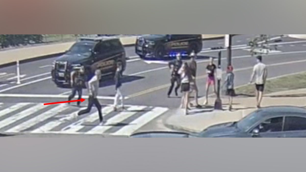 Police officers standing near a crime scene in Washington, D.C.