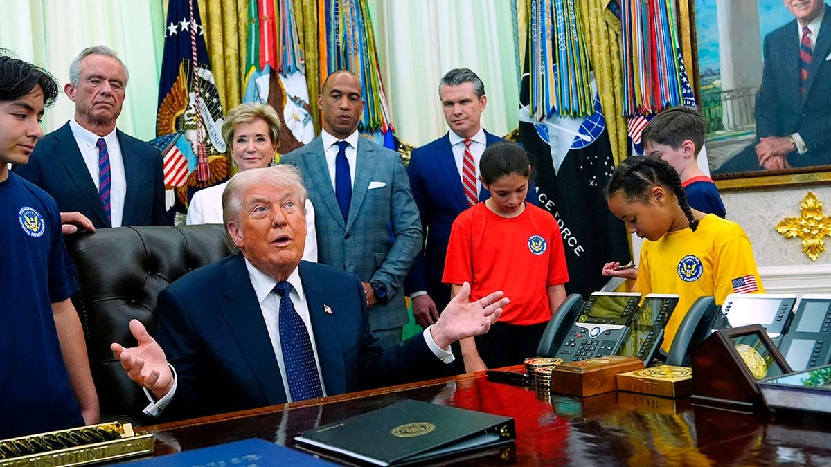 President Donald Trump speaking in the Oval Office at the White House