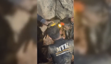 Rescuers evacuate the first of 5 villagers found trapped in a cave in Laos; 2 still missing