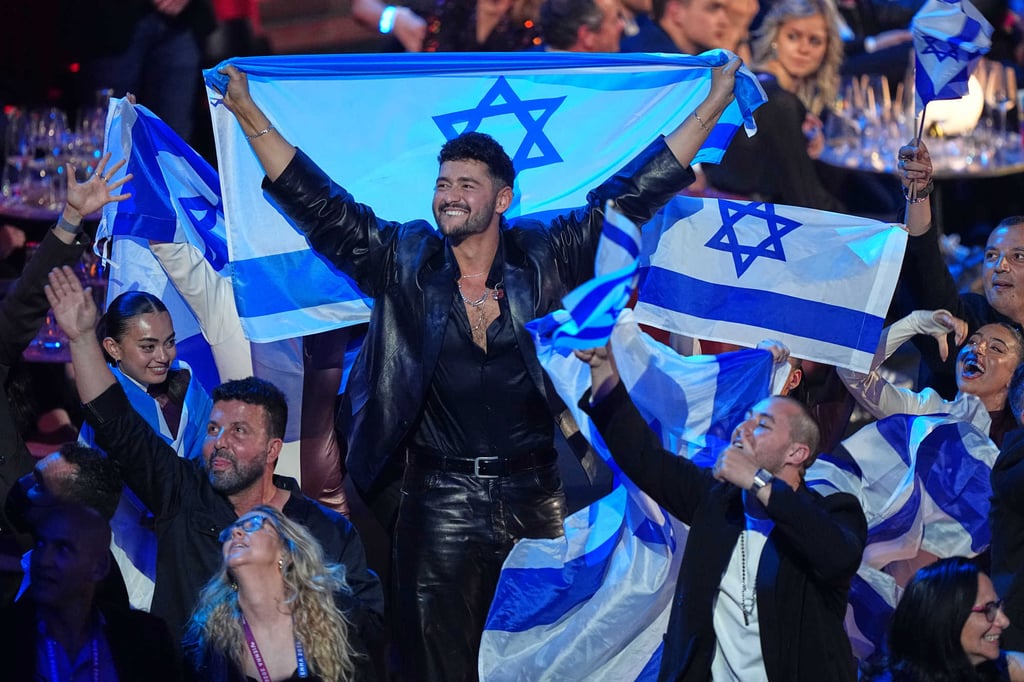 Noam Bettan from Israel (centre) reacts as the points are awarded during the grand final of the 70th Eurovision Song Contest in Vienna, Austria. Photo: AP