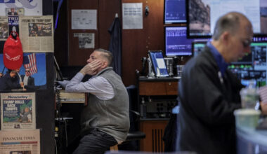 Wall St slips as inflation fears push yields higher