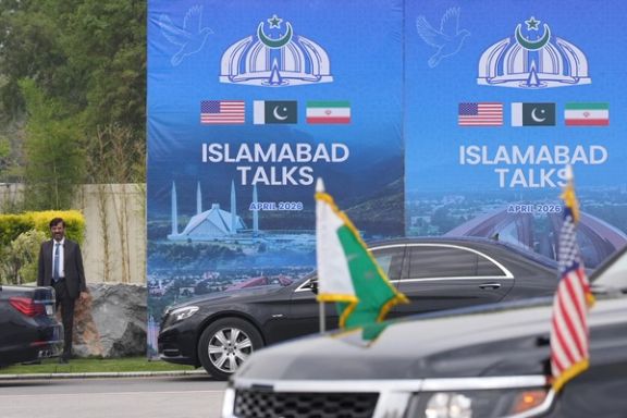A Pakistani official stands during the arrival of the US Vice President JD Vance for talks with Iranian officials in Islamabad, Pakistan, April 11, 2026.