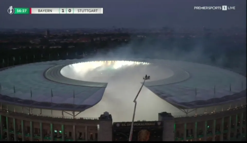 The pitch was not visible from above due to the smoke generated by flares