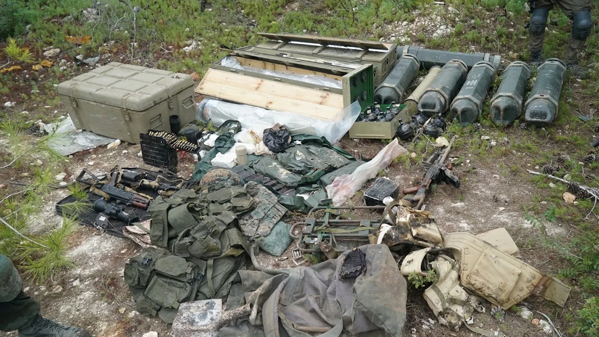 IDF troops inspecting Hezbollah weapons cache near UNIFIL post in southern Lebanon