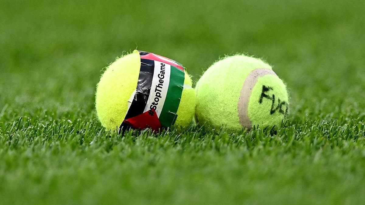Tennis balls scattered on the pitch at Aviva Stadium in Dublin