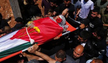 Palestinian man shot dead while climbing West Bank barrier into Israel in search of work