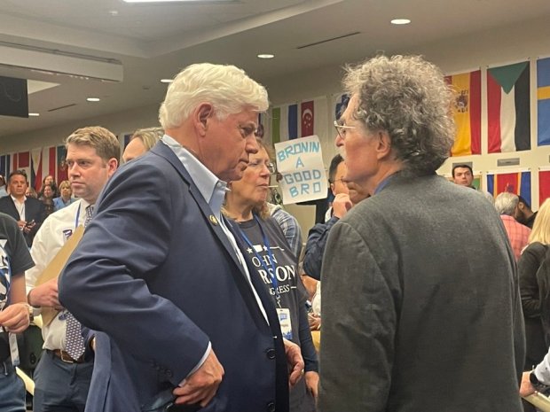 U.S. Rep. John Larson talks to a supporter at the convention Monday, May 11. (Christopher Keating/Hartford Courant)