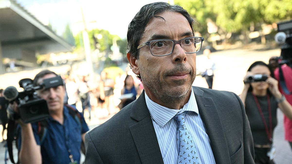 California physician Mark Chavez exiting federal court in Los Angeles