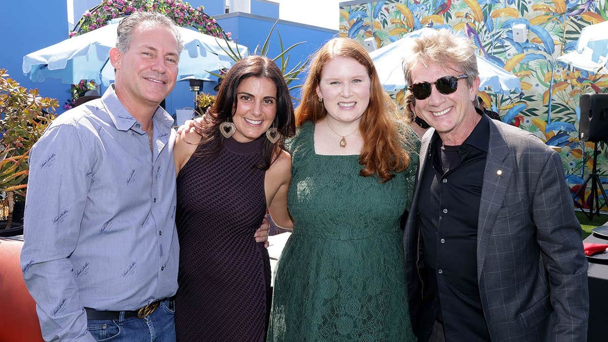 Martin Short standing with Gavin B. Keilly, Tara-Jane Flynn, and Katherine Short at a luxury lounge event