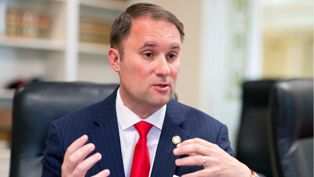 Virginia Attorney General Jason Miyares speaking during an interview in Richmond office