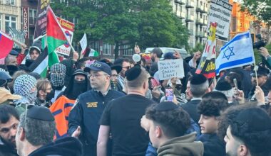 Police lined the area as hundreds came out on both sides of the issue of land sales in the Middle East. (Spectrum News NY1/Louis Finley)